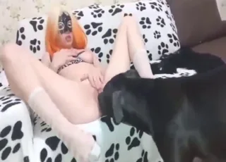 Red-haired girl enjoys hard licking session in zoo setting